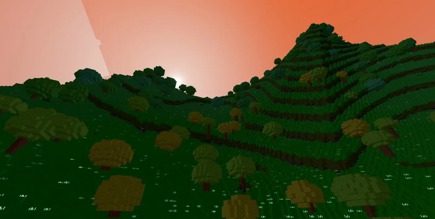 Green hills under a pink dusk sky